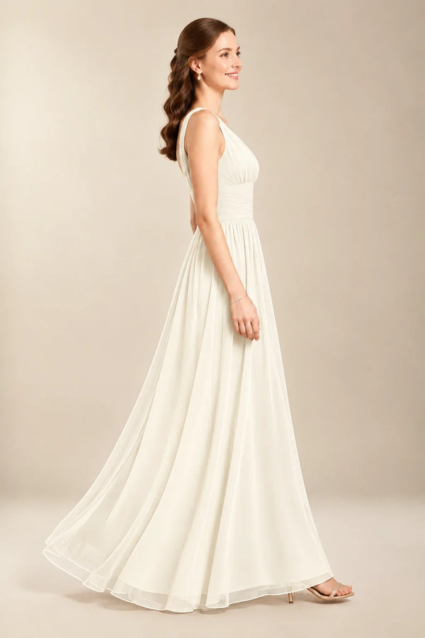 Chantel Ivory chiffon wedding dress, side view of flowing floor-length skirt