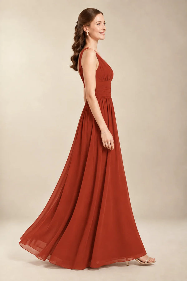 Chantel Rust chiffon bridesmaid dress, side view of flowing floor-length skirt